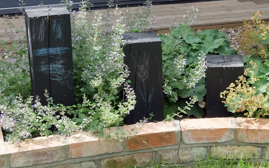 Posts painted with blackboard chalk